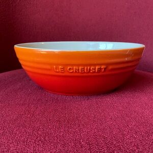 Brand new Le creuset stoneware Flame orange oval multi bowl 1 qt
